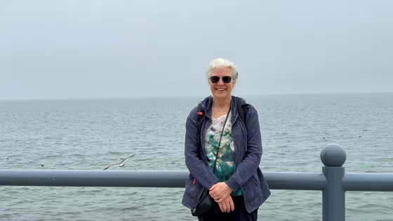 Alison Rodger standing beside a bridge