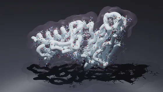 3D rendering of a complex protein structure with atoms represented by colored spheres against a gray background.