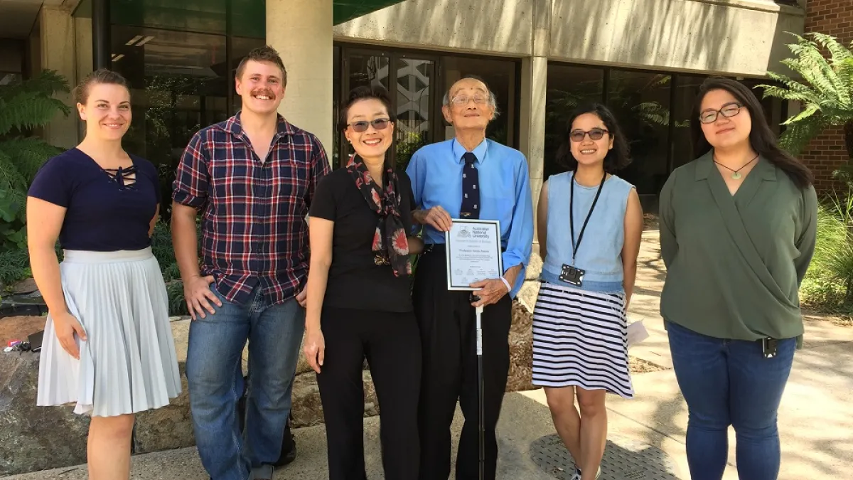 A group of people looking at the canera smiling