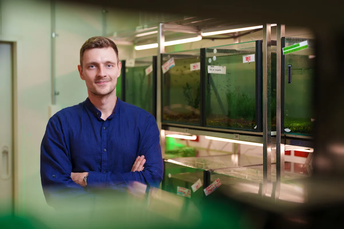 man with fish tanks